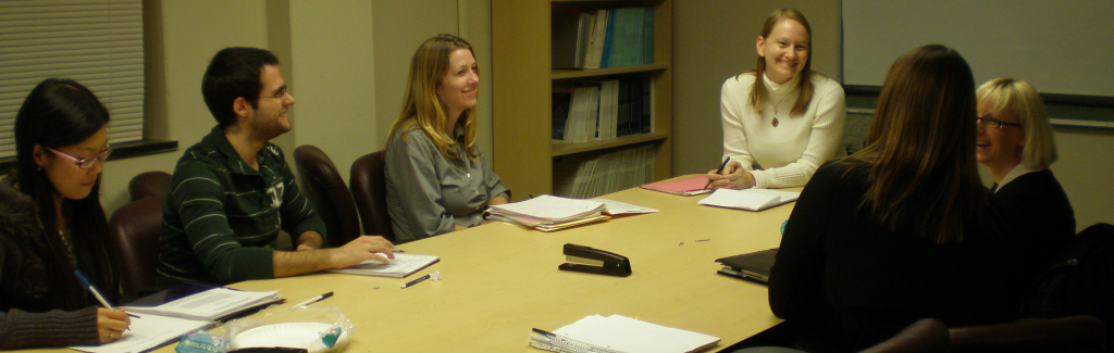 Dr. Buckner with graduate student therapists in clinical supervision