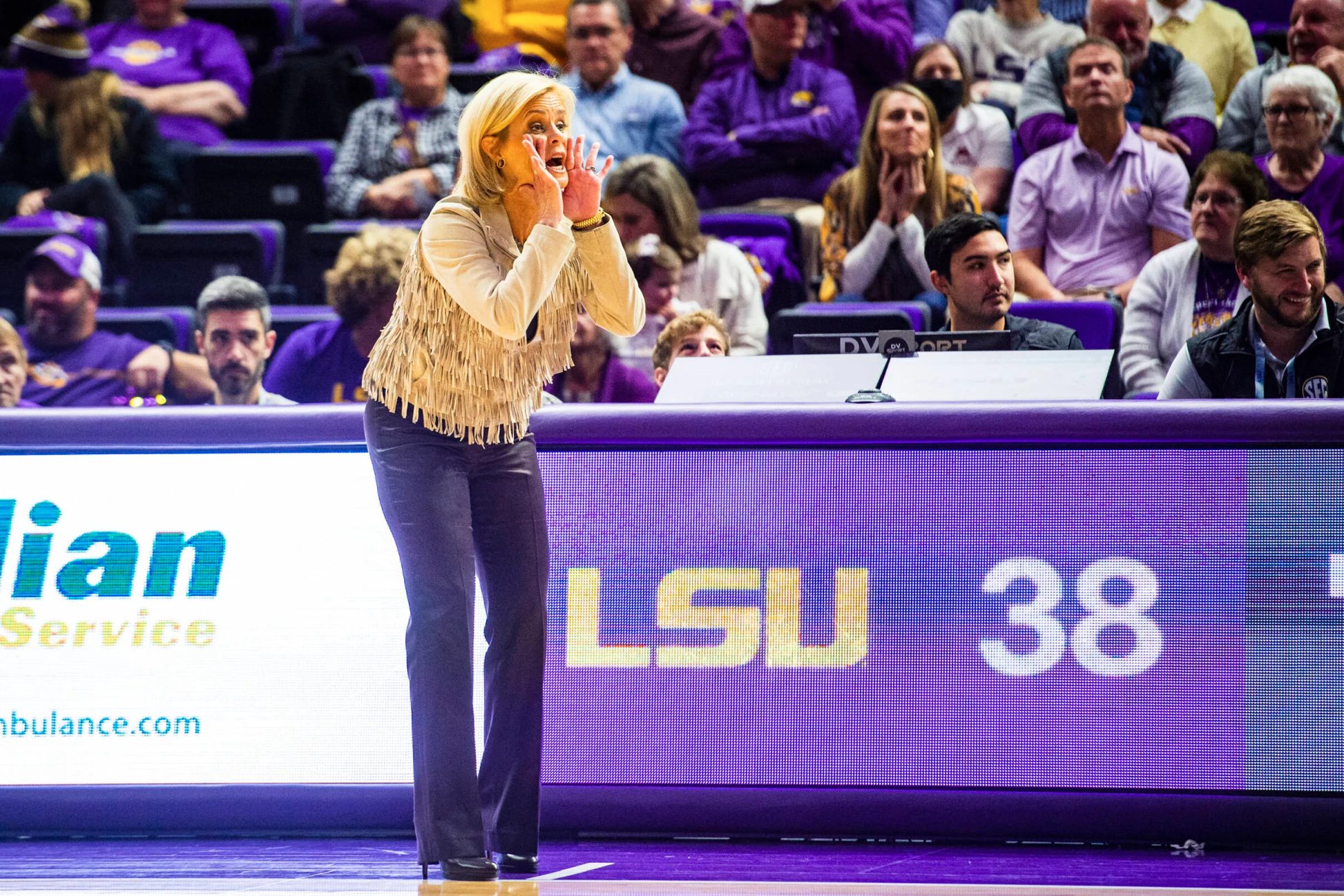 Coach Kim Mulkey calls out a play during a basketball game against FGCU.