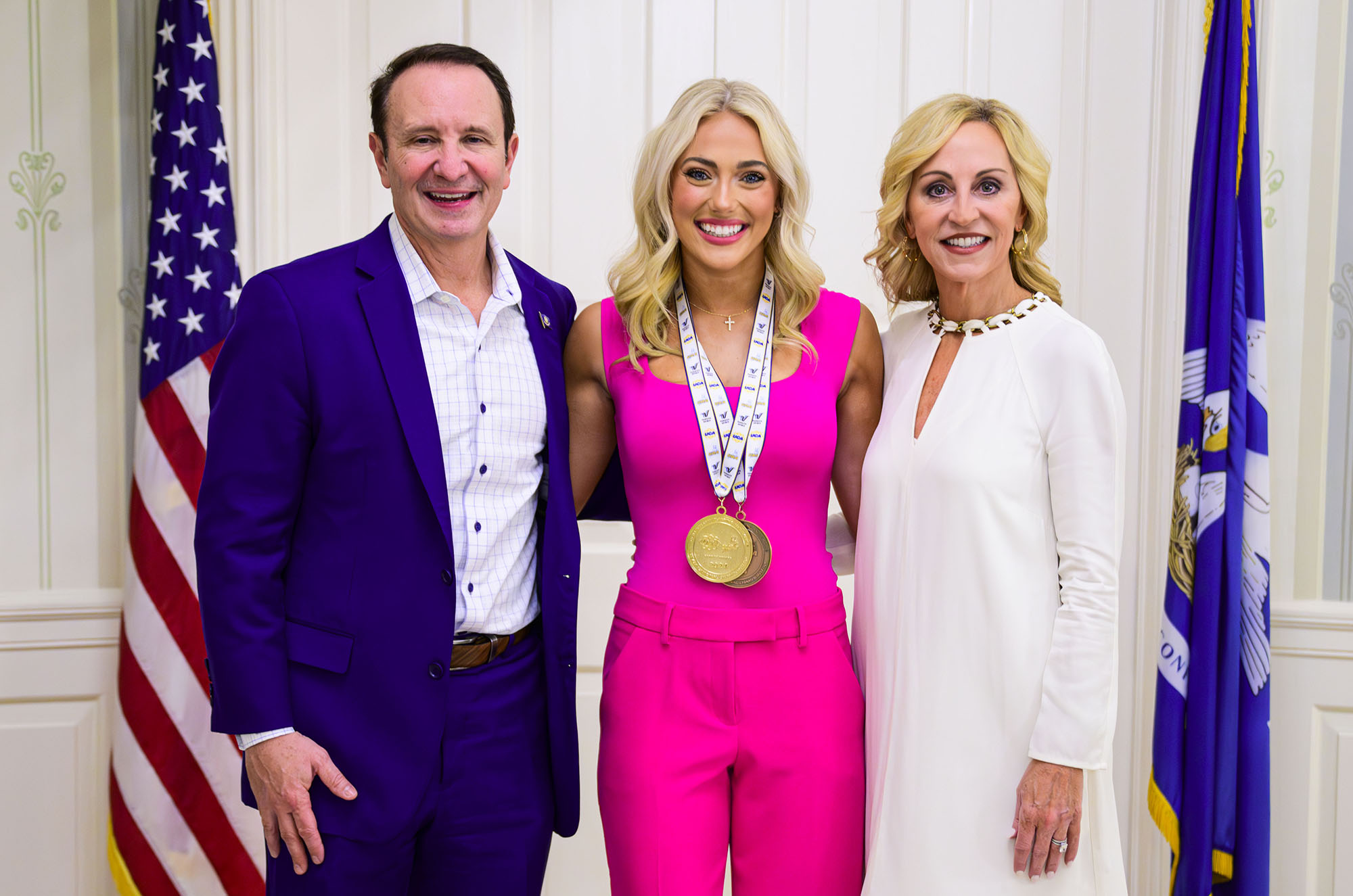 Tiger Girls dancer Darah Haidet with Lousiana Gov. Jeff Landry and first lady Sharon Landry