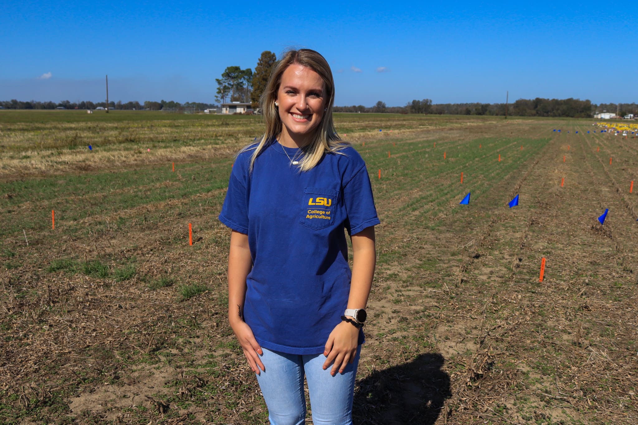 Katie Mestayer standing in a field