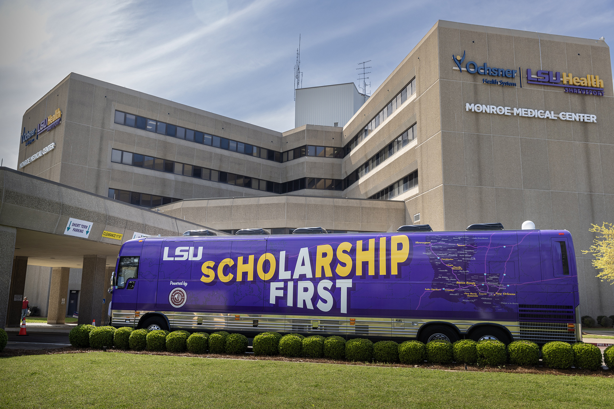 Scholarship First bus in front of Monroe Medical Center