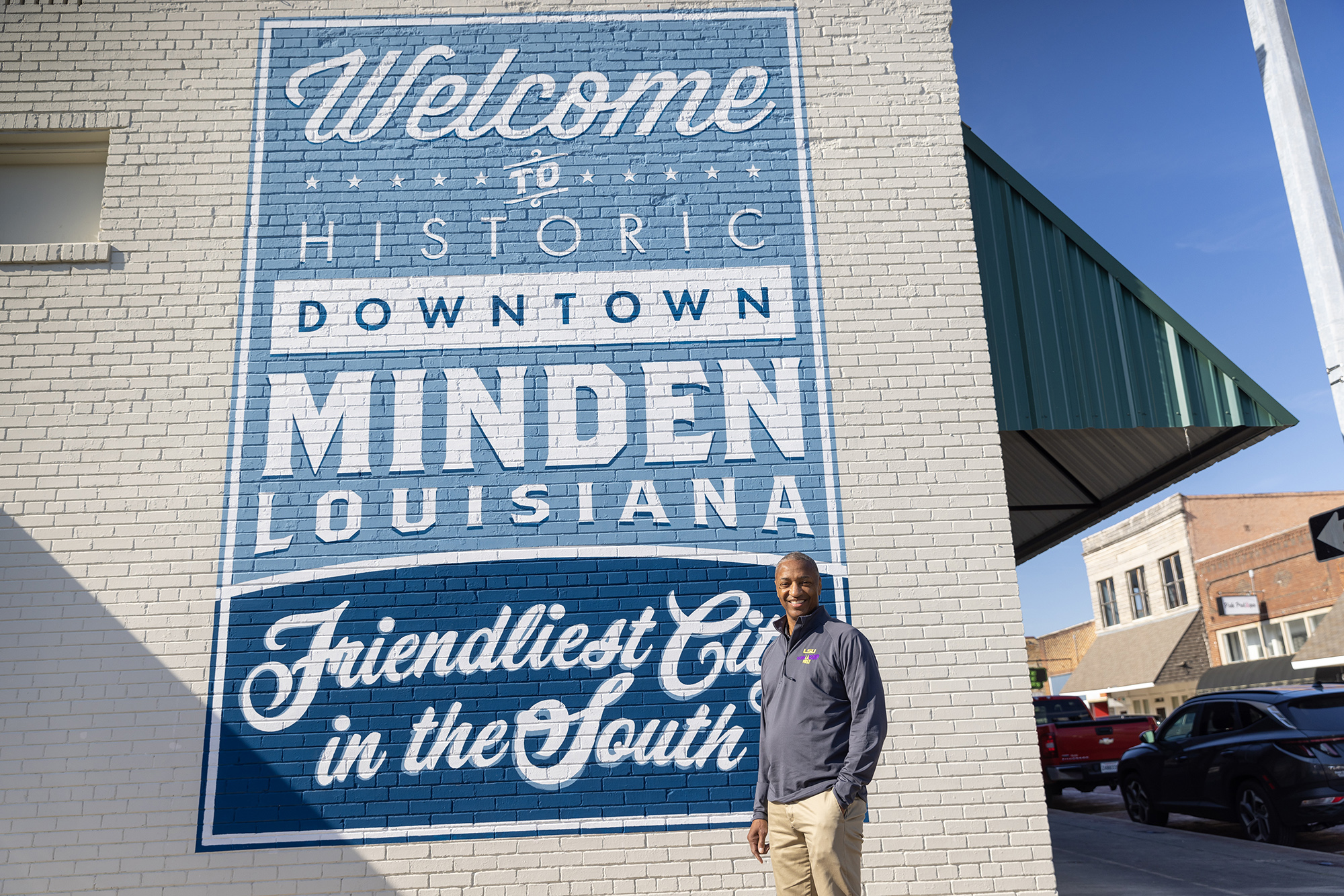 President Tate with Minden welcome sign