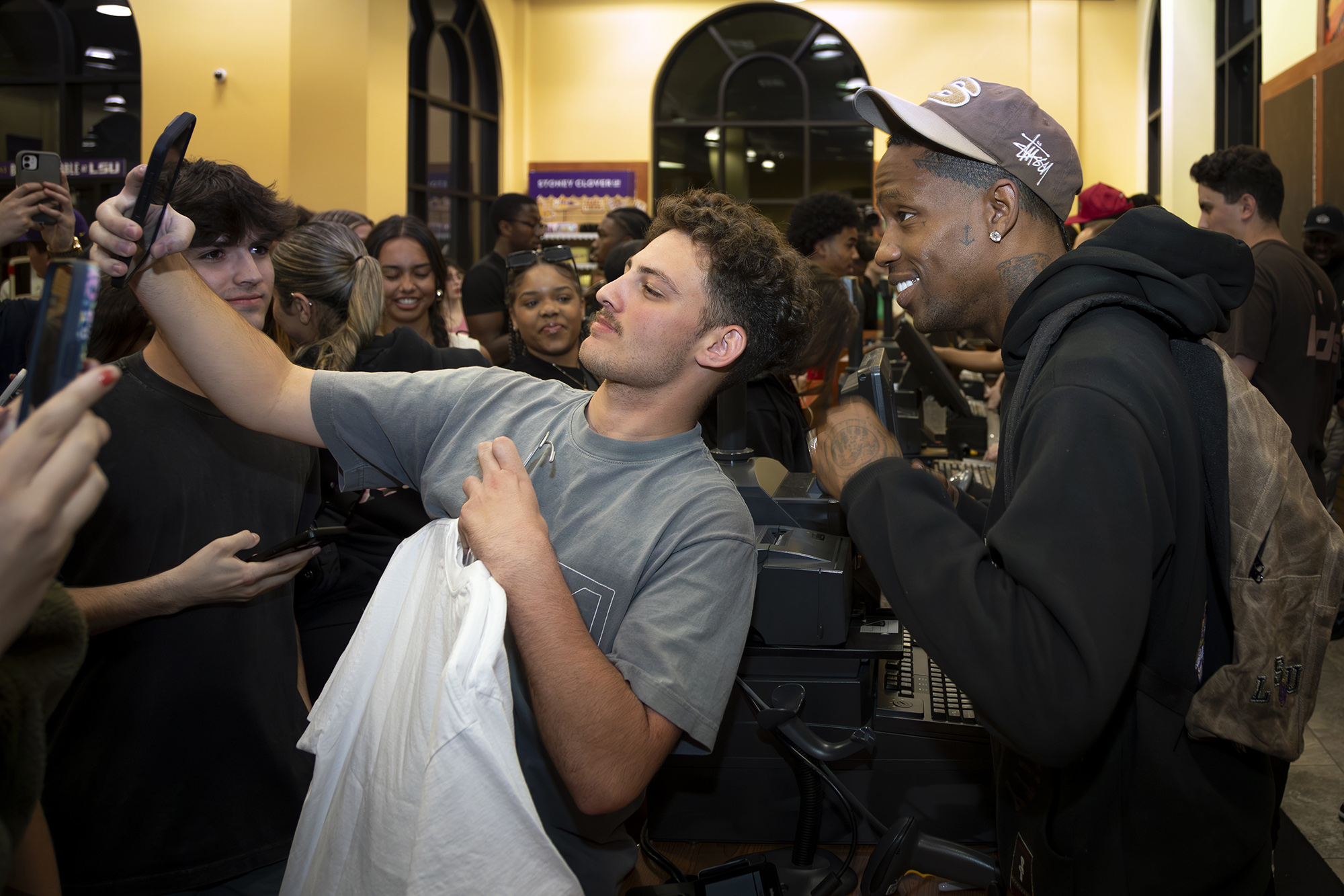 LSU student poses with rapper Travis Scott