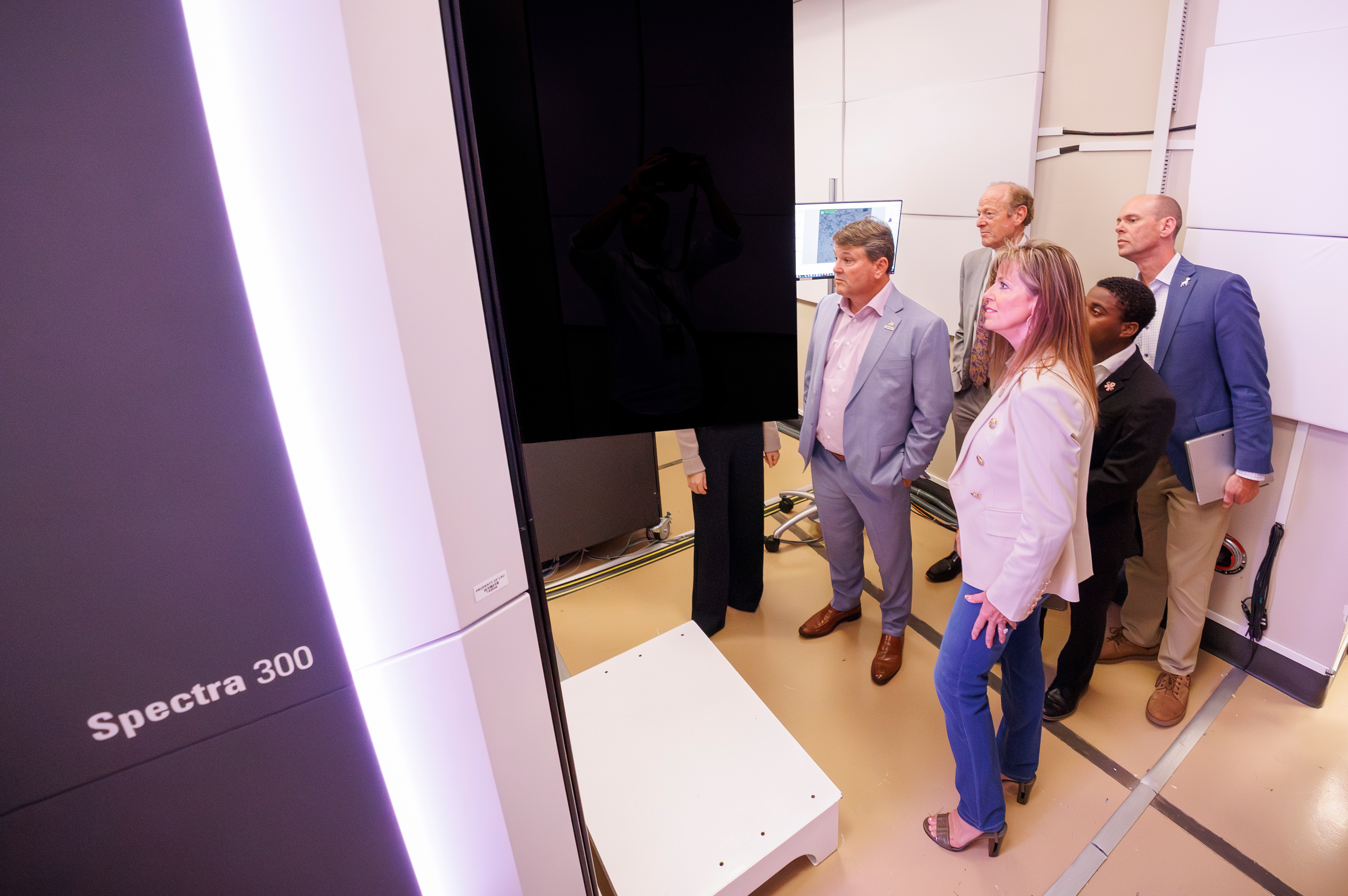 Visitors view LSU's new Spectra 300 Scanning Transmission Electron Microscope