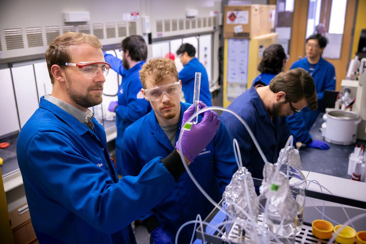 Researchers inside of a lab