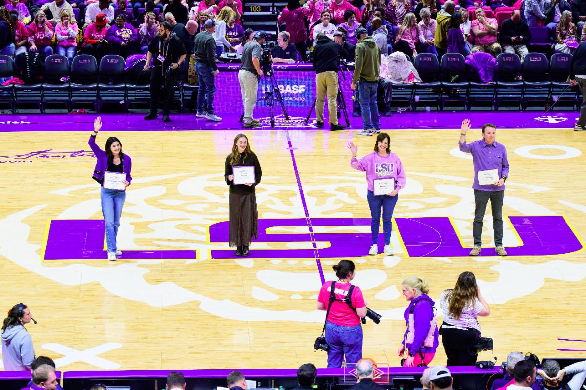 Four LSU employees receive recognition for their work at a Women's Basketball Game