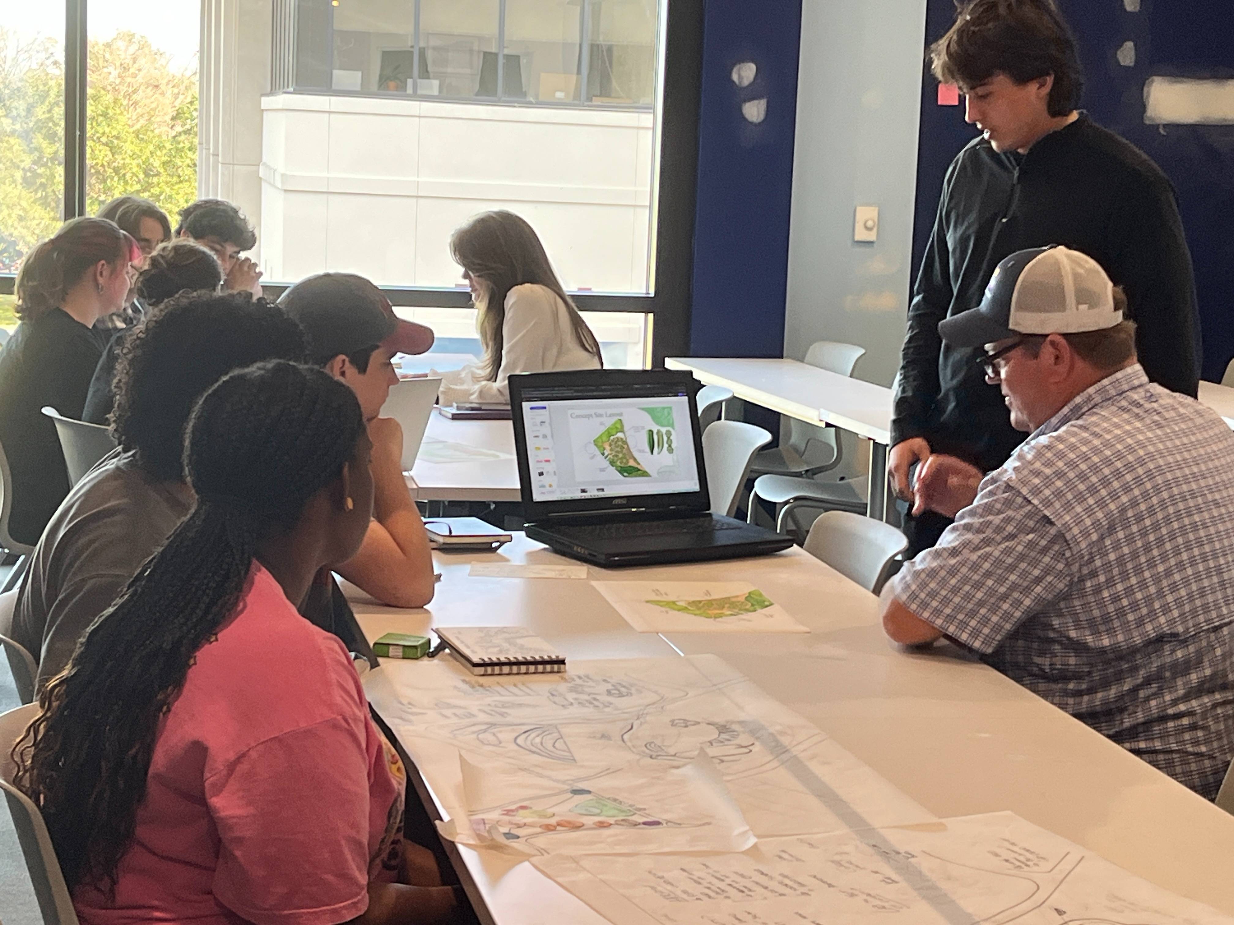 Students present their micro-farm for the LSU AgCenter Botanic Gardens at Burden Museum and Gardens