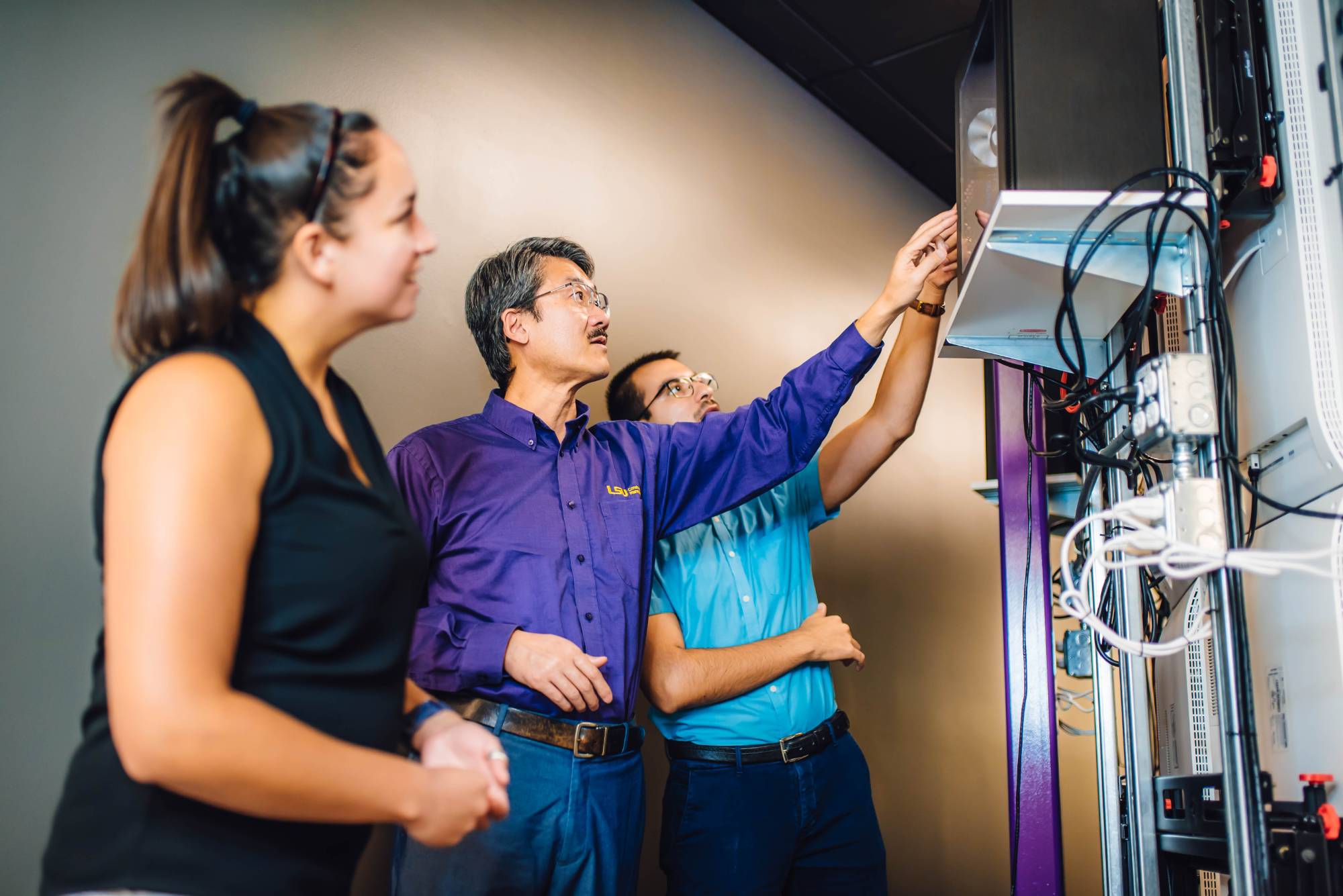 LSU construction management faculty member with students