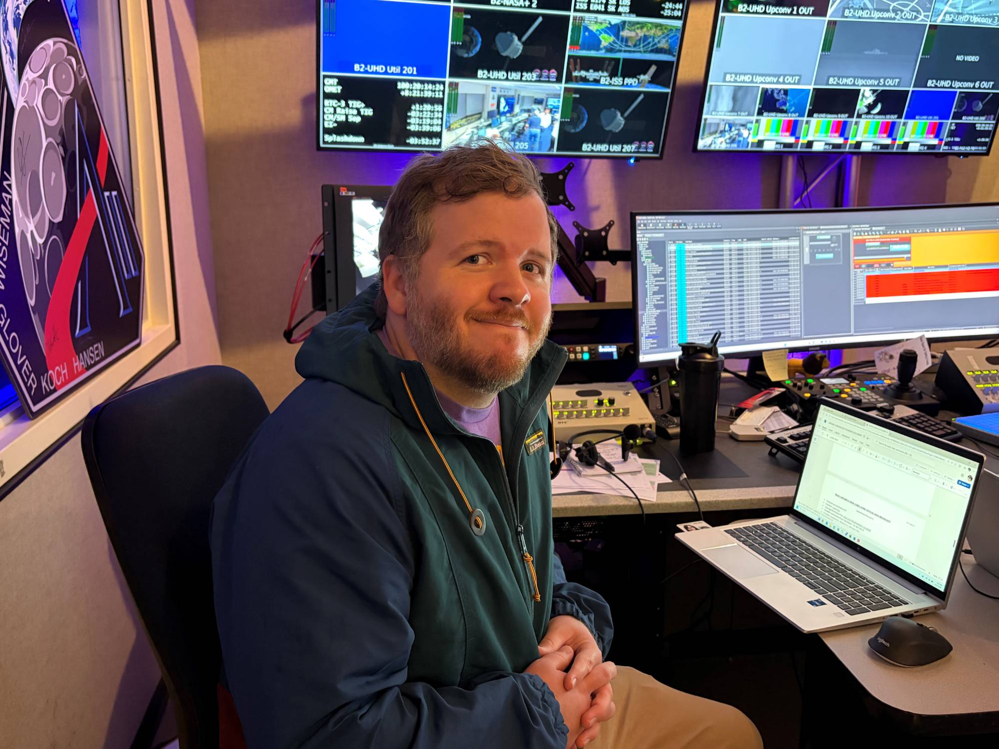 John Hughes in front of a computer inside a studio in Johnson Space Center