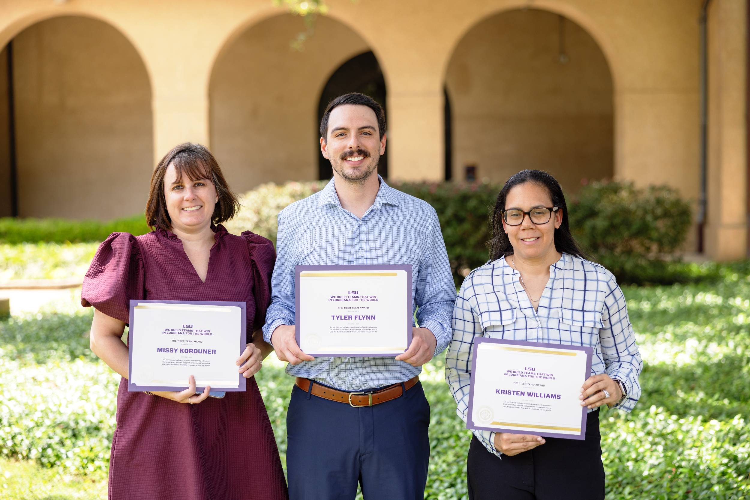 The We Build Teams That Win team for April with their certificates