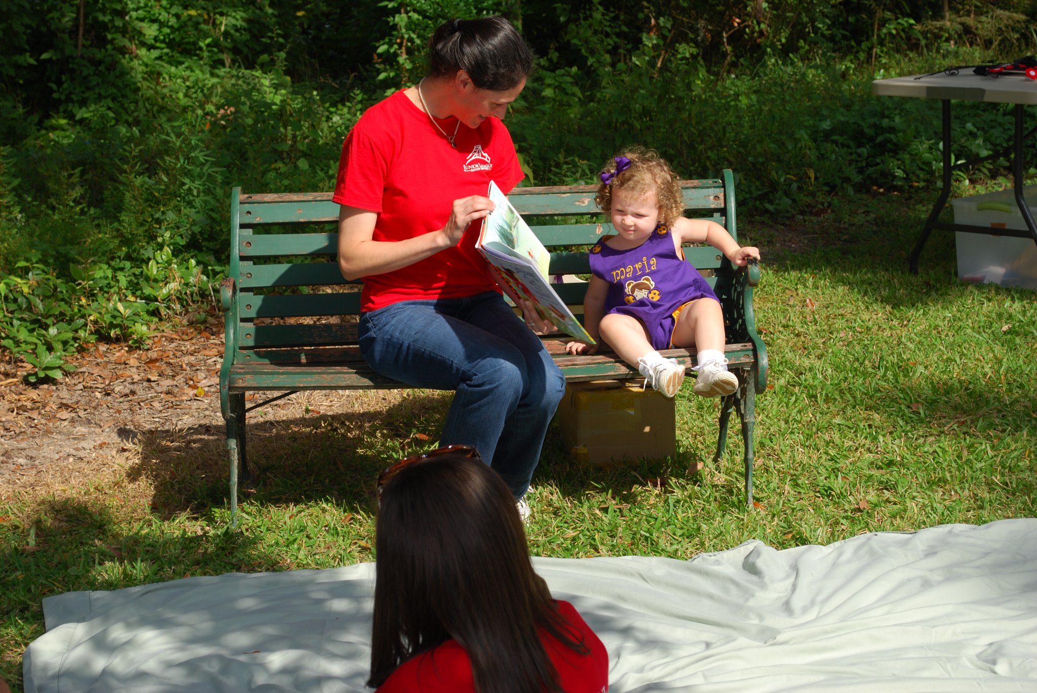 volunteer reading to a toddler
