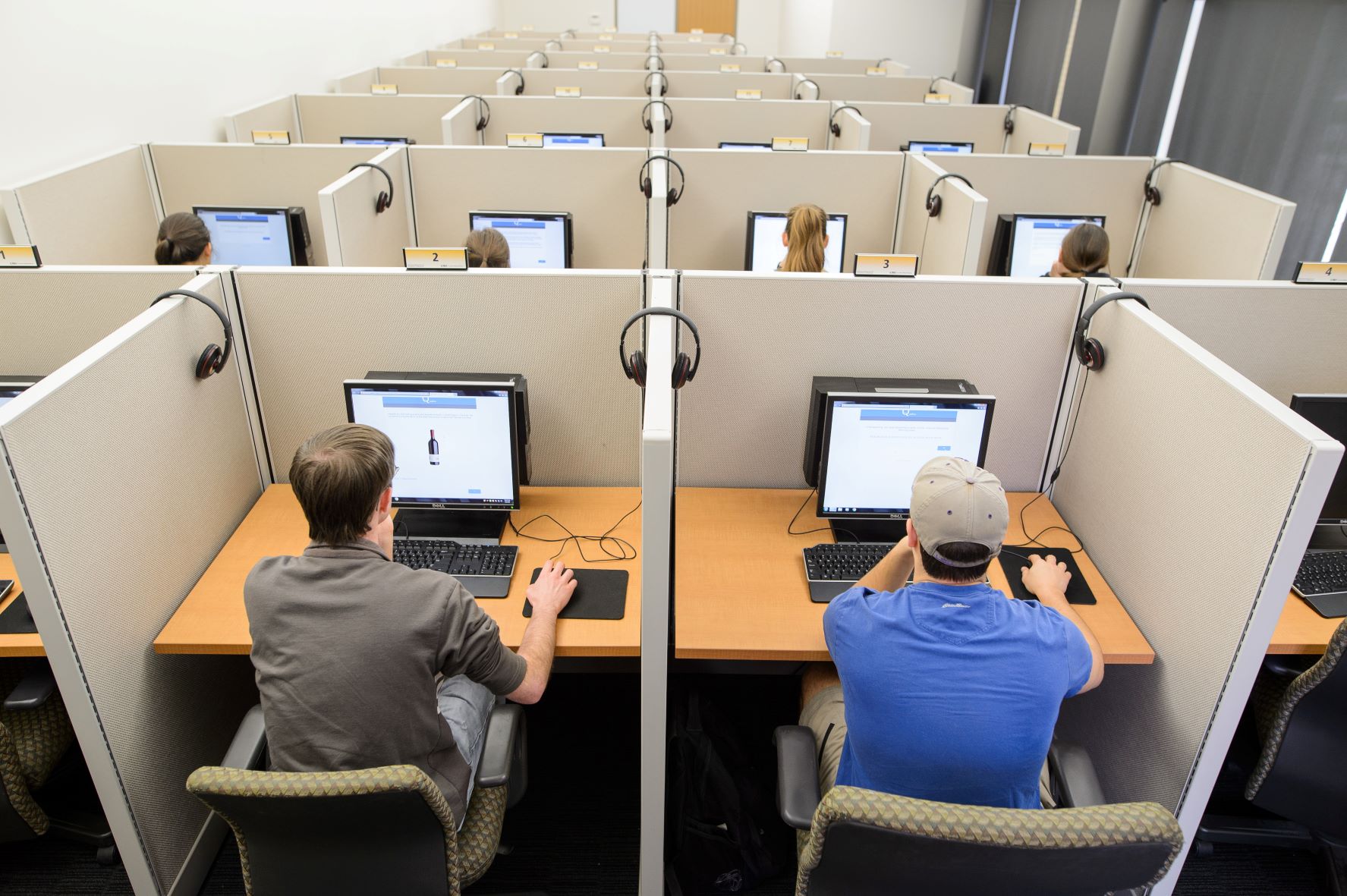 Students use computer stations in research lab