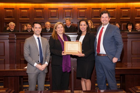 National champion LSU Law students pose with their award