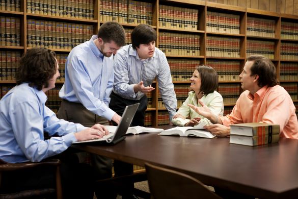 LSU Law students have a group discussion in the Paul M. Hebert Law Center's library
