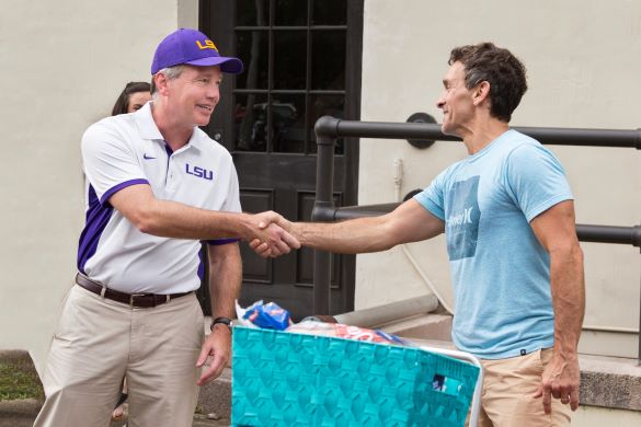 President King Alexander Shakes Hands With A Parent On Move In Day