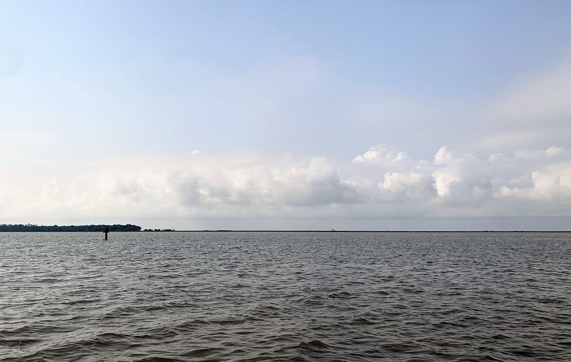 A picture of the ocean and sky