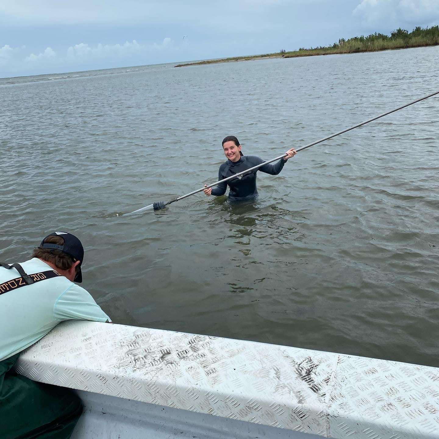 LSU researchers retrieve a core sample from the waters of the Gulf of Mexico