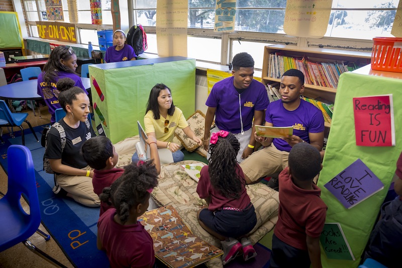 LSU students reading to grade school children