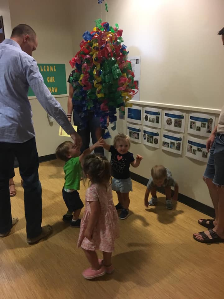 Children with art at the gallery.