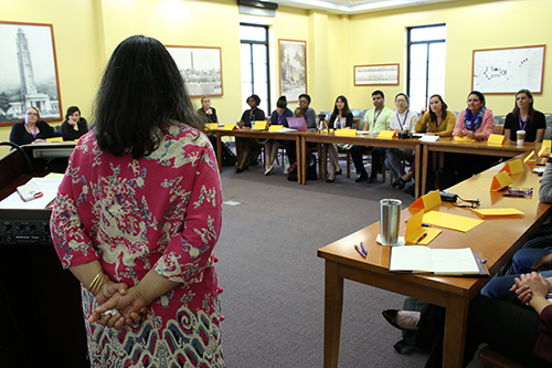Photo of Dr. Nina Asher speaking to participants