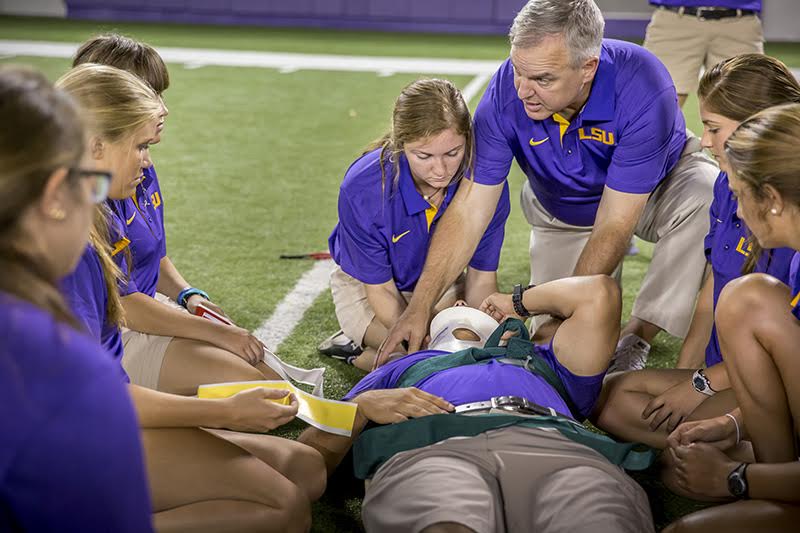 Ray Castle demonstrating to an athletic training class