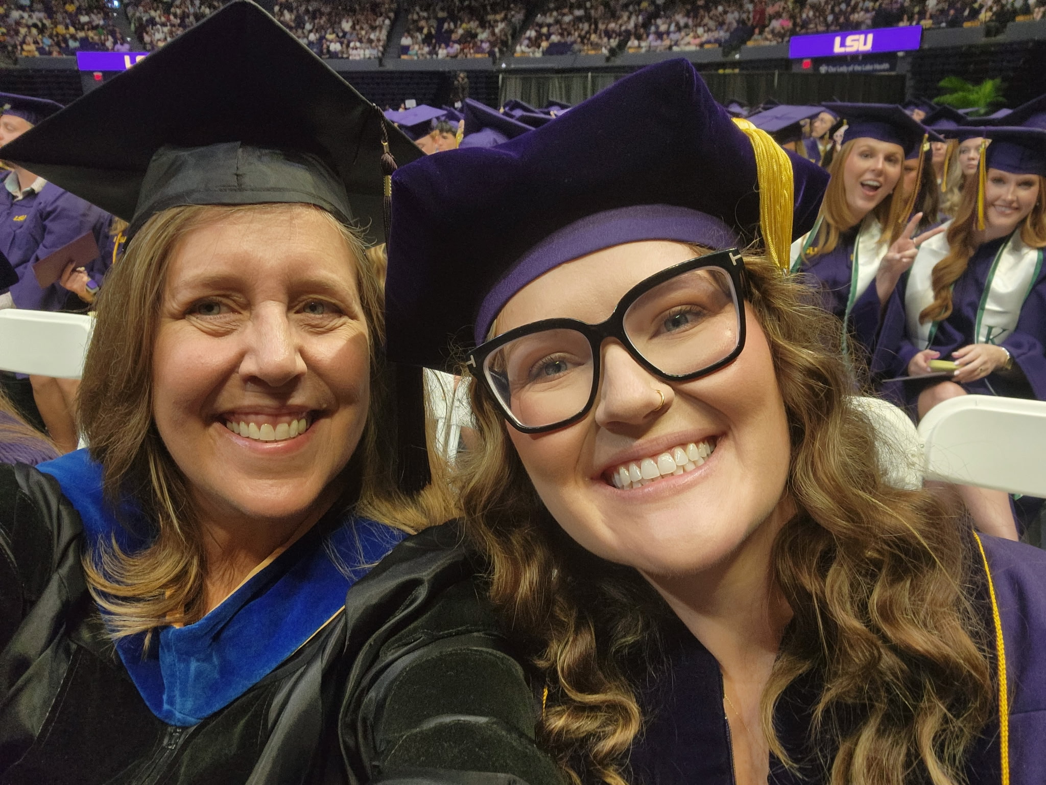 Taylor Gauss and Jan Hondzinski at the LSU College of Human Sciences & Education commencement