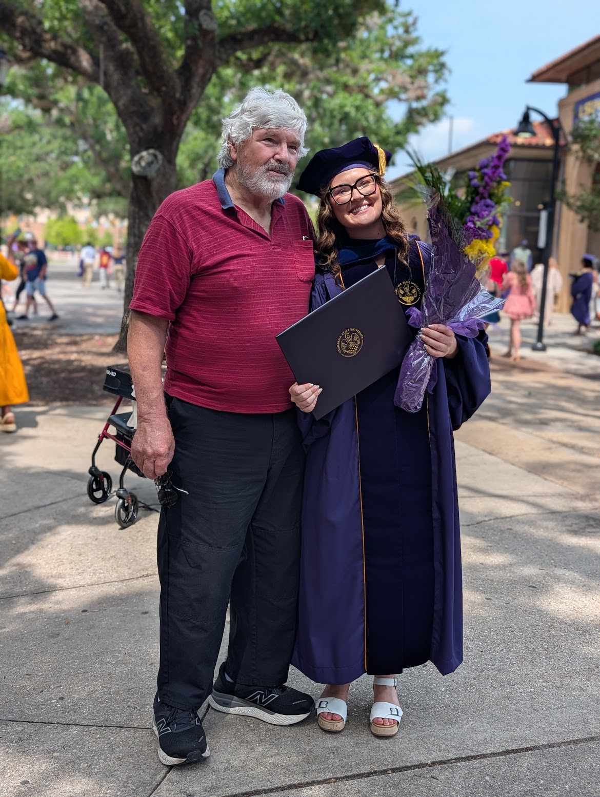 Taylor Gauss and a family member at the CHSE commencement