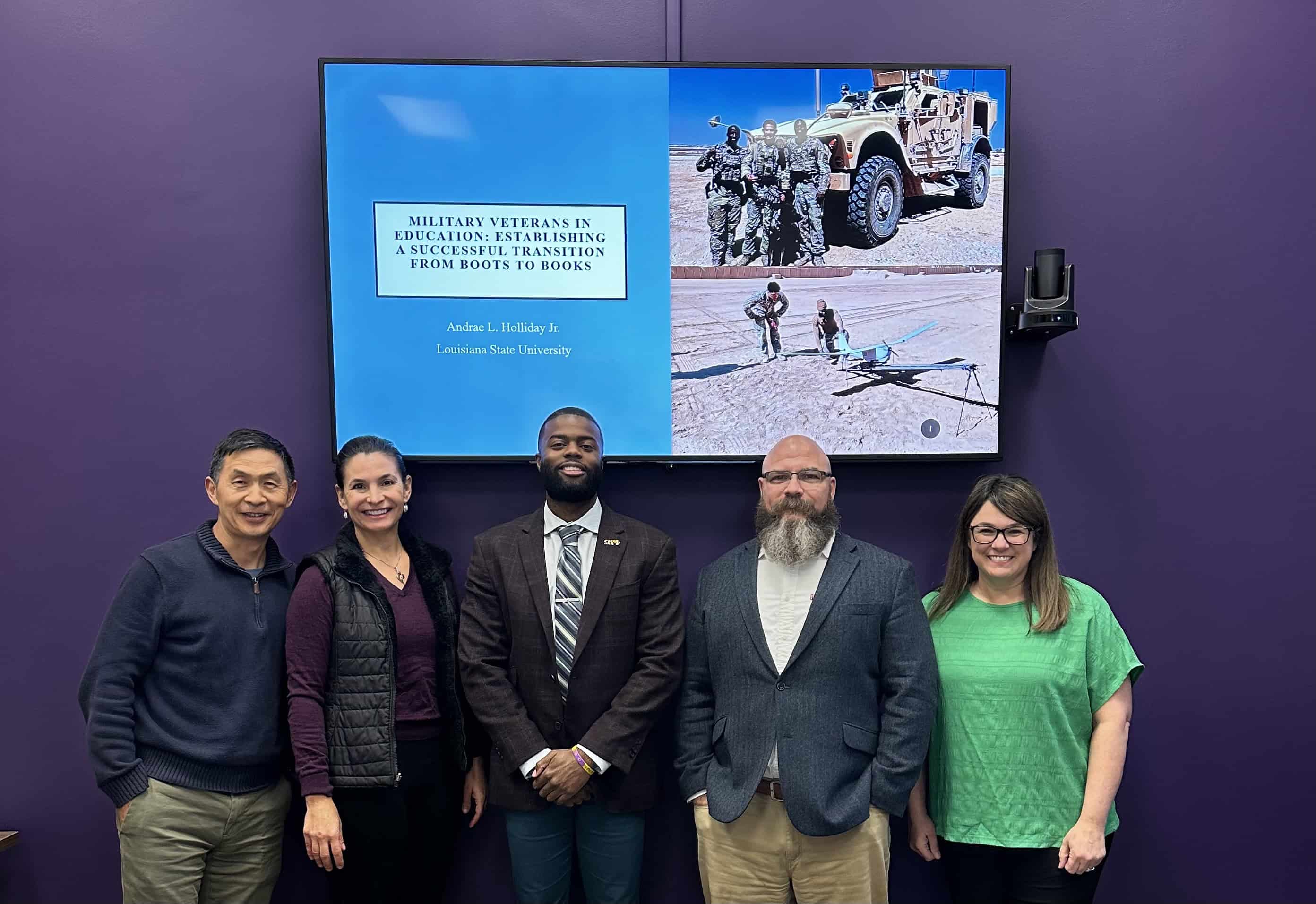 Andrae Holliday with School of Leadership & Human Resource Development faculty at his dissertation defense
