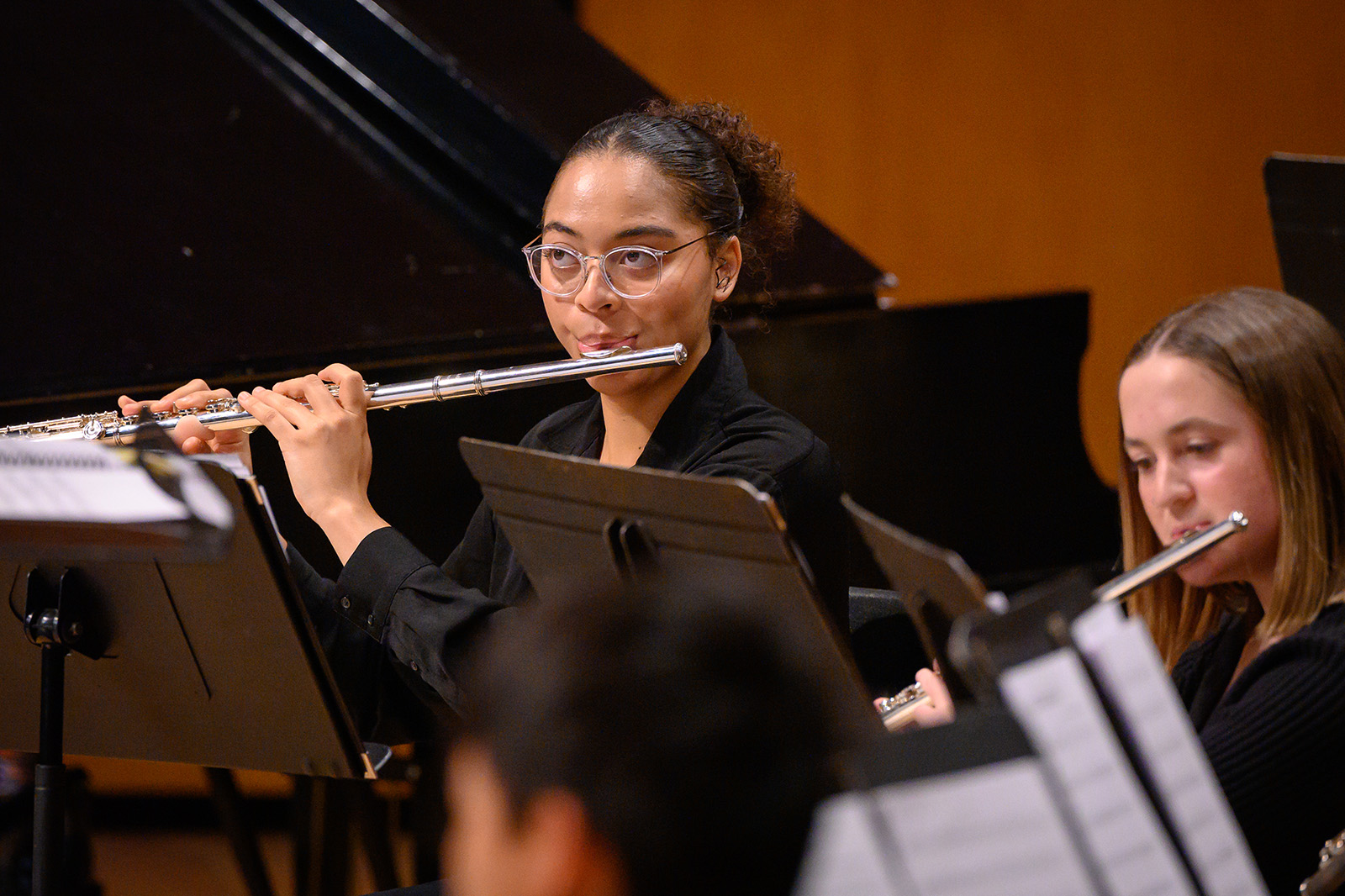 flute player performing at a concert