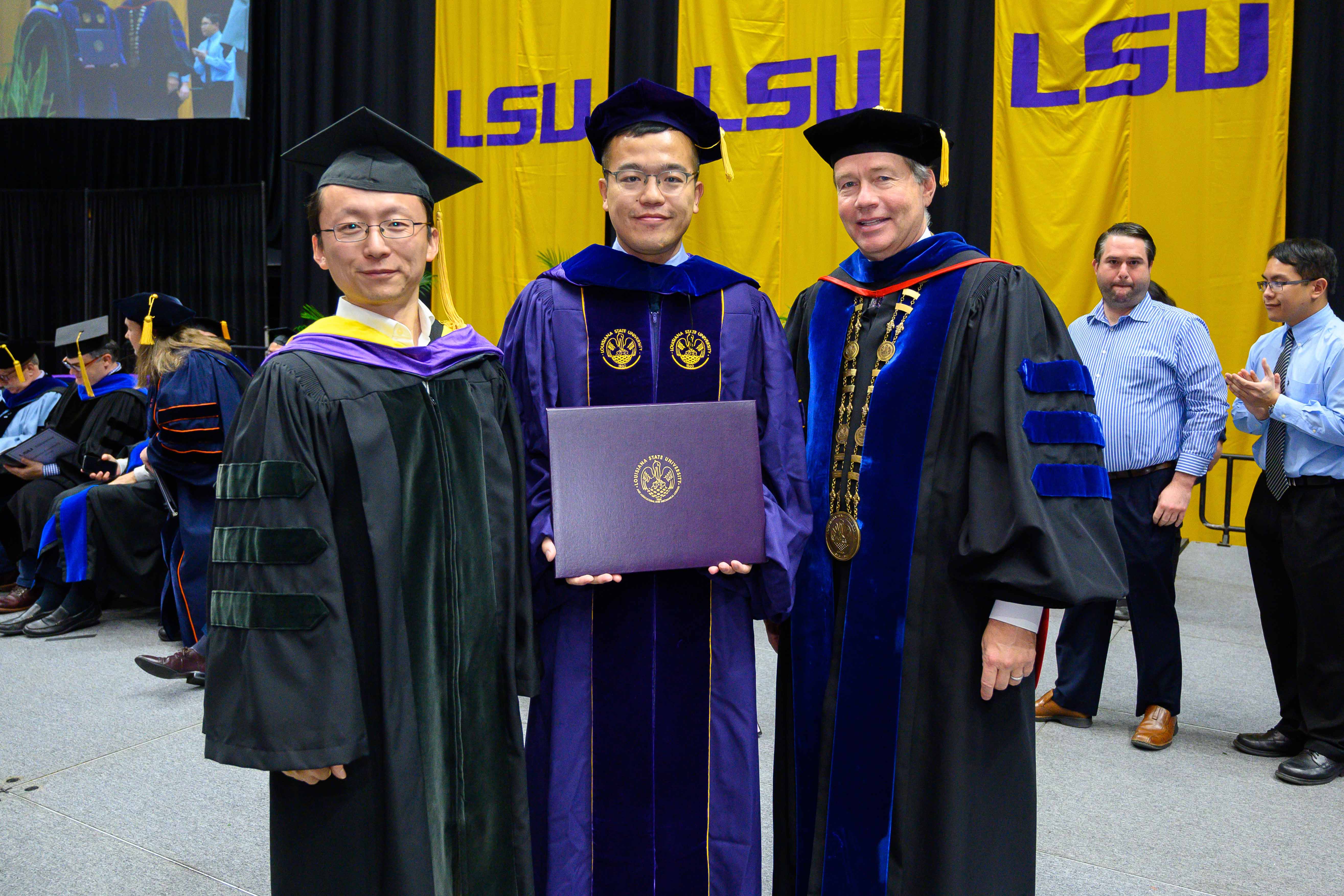 Photo of Chuanlin Zhao, Prof. Ye Xu, and President Alexander