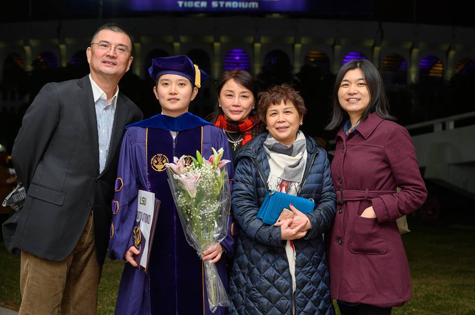 Photo of Yuxin Fang and family
