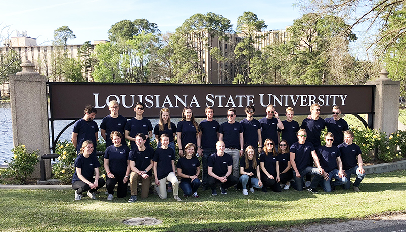 German Fulbright students in front of LSU sign