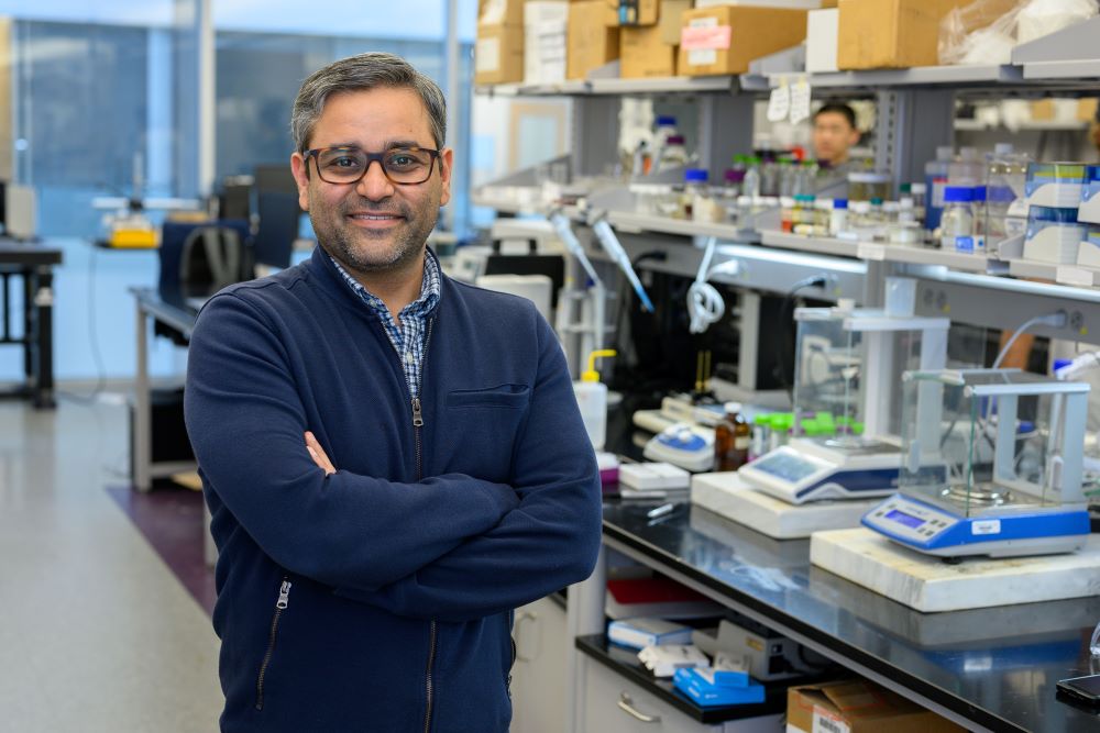 Bhuvnesh Bharti stands in a lab