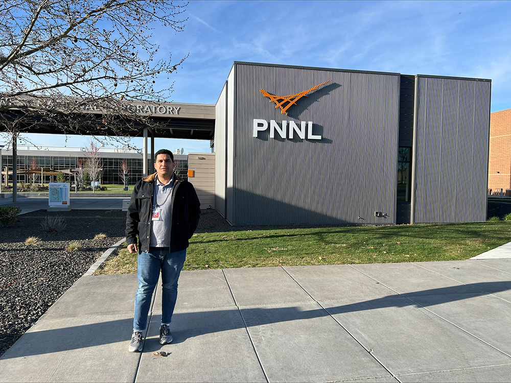 Mohamed Hassan stands outside Pacific Northwest National Laboratory