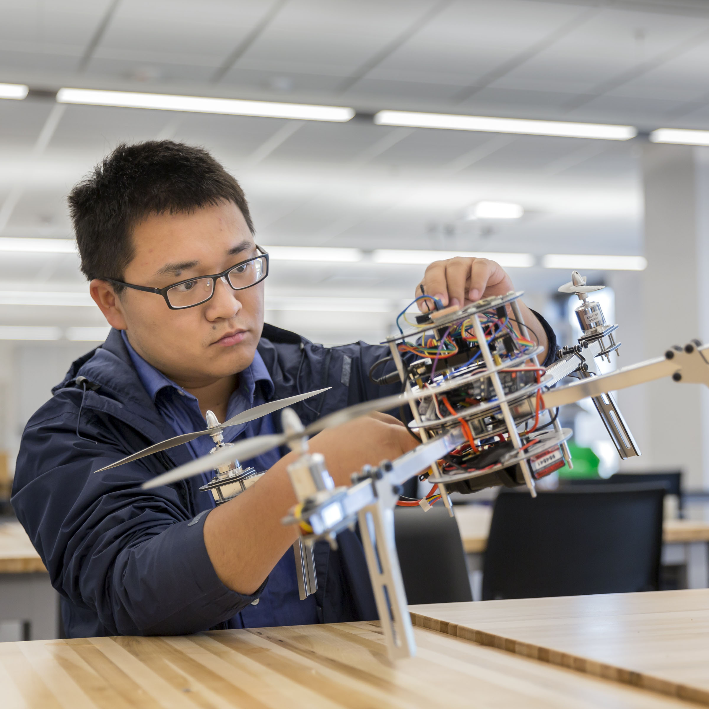 Student working with drone