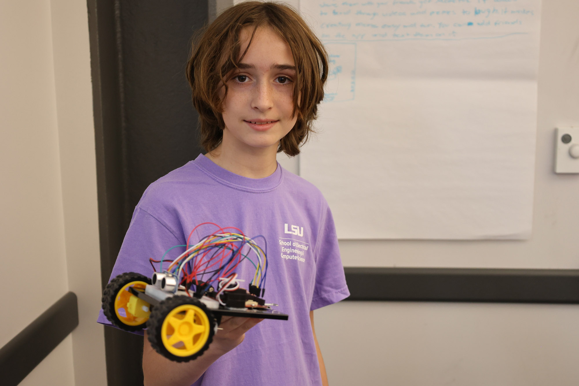 Student presents his car