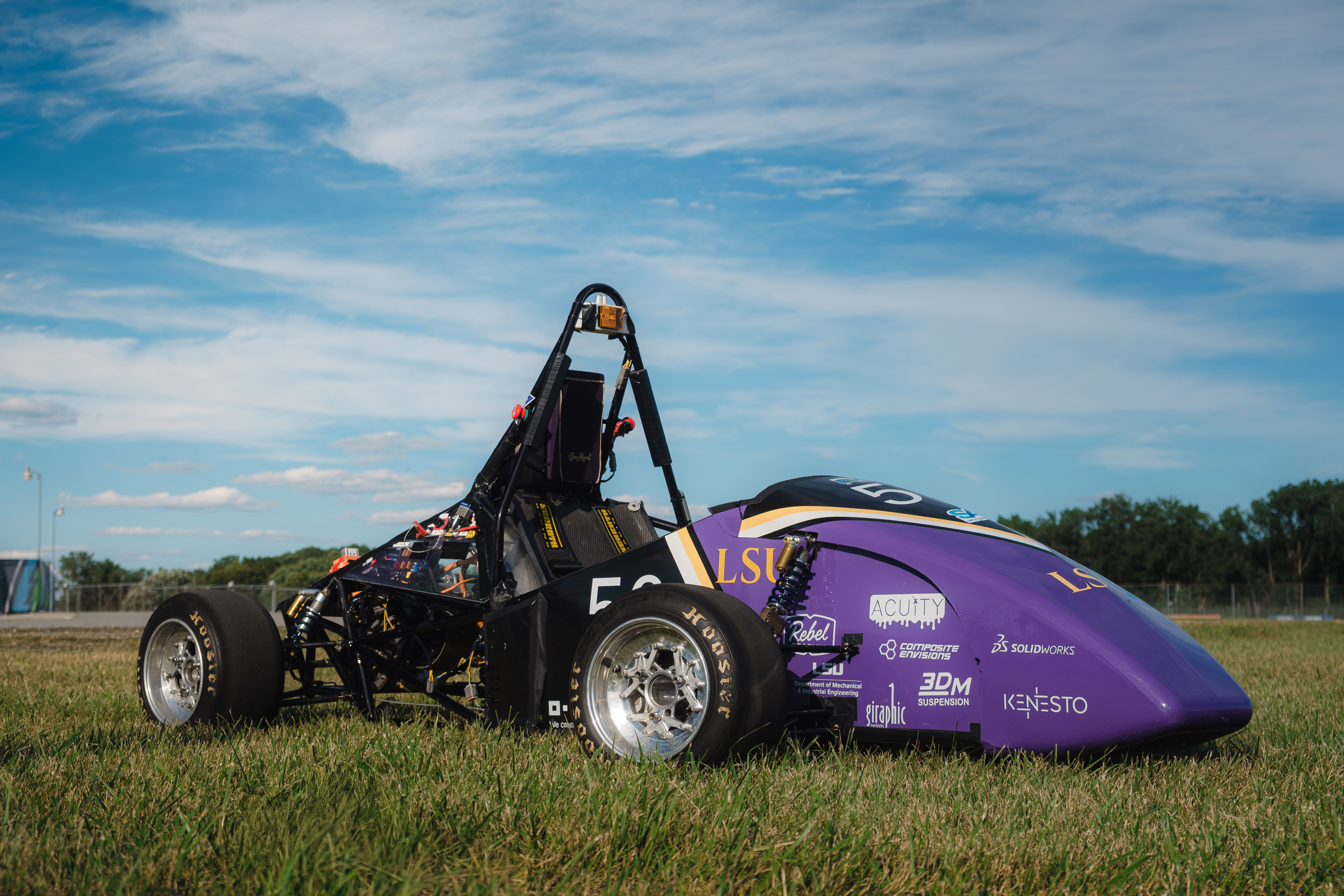 Picture of the car sitting on the grass