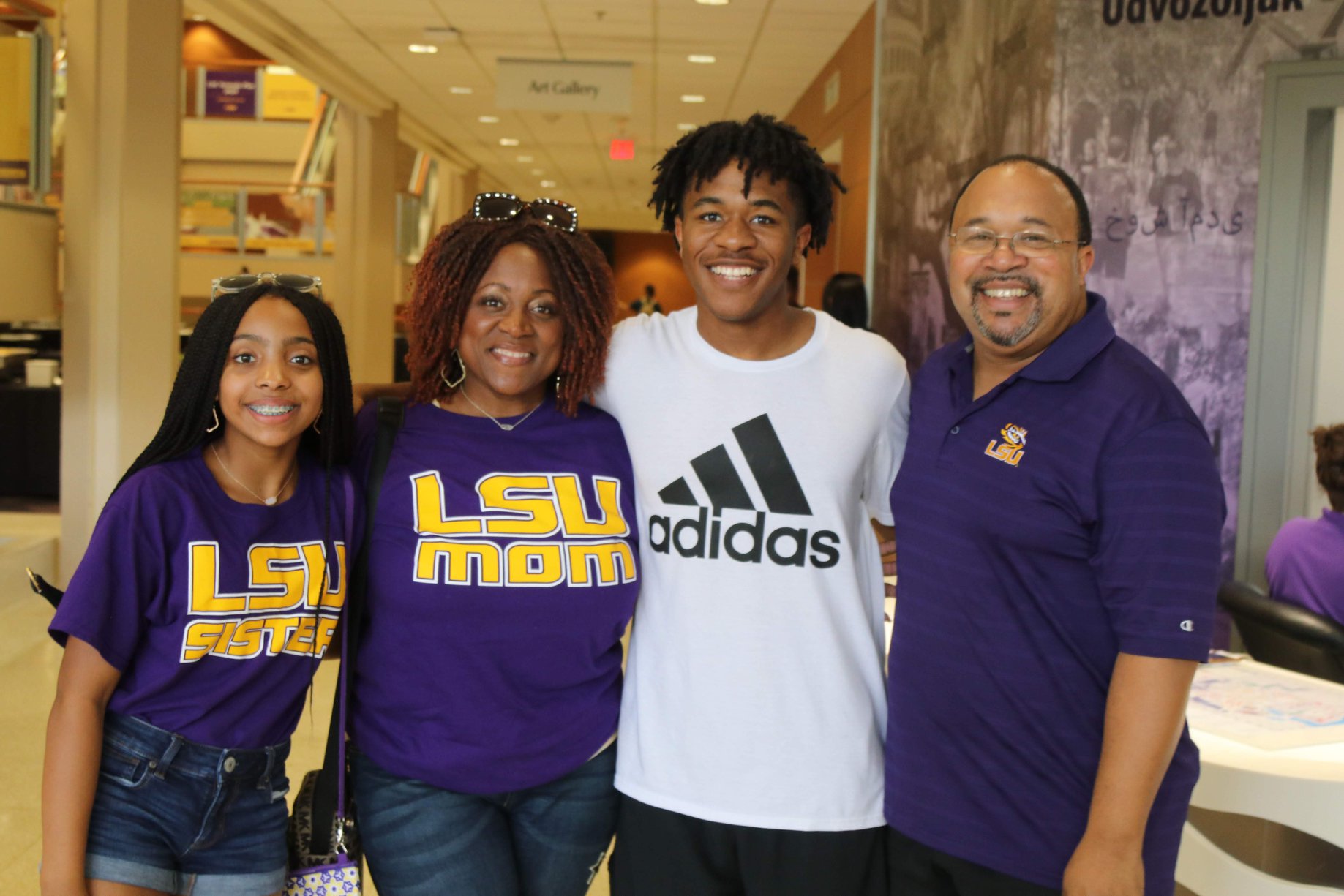 family in LSU family shirts