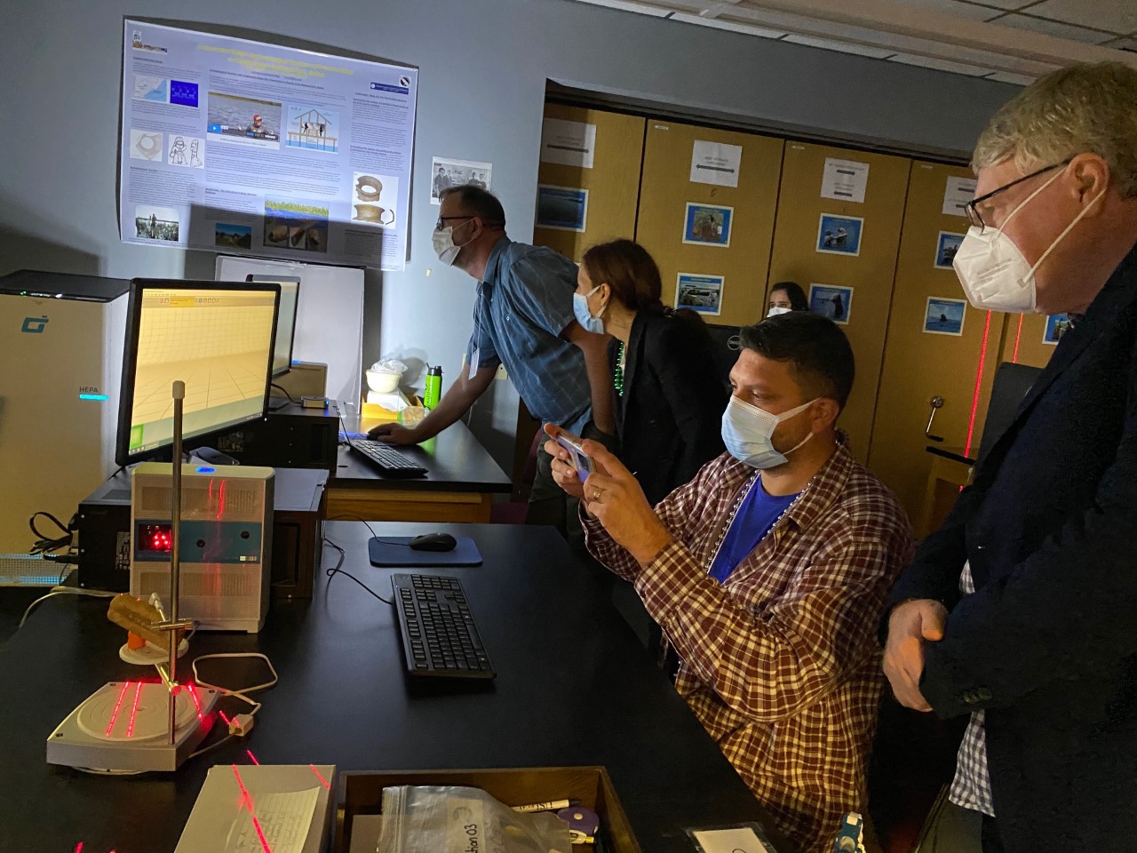 Undergraduates Conan Mills, Eric Labar, and Isabella Lemoine demonstrated use of 3D scanners in the DIVA lab during the tour