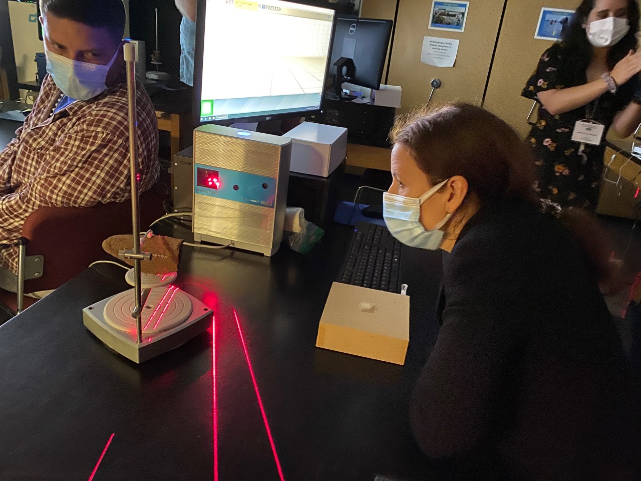 Undergraduates Conan Mills, Eric Labar, and Isabella Lemoine demonstrated use of 3D scanners in the DIVA lab during the tour