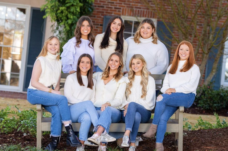 kappa  delta 2022 goverining council seated on a bench