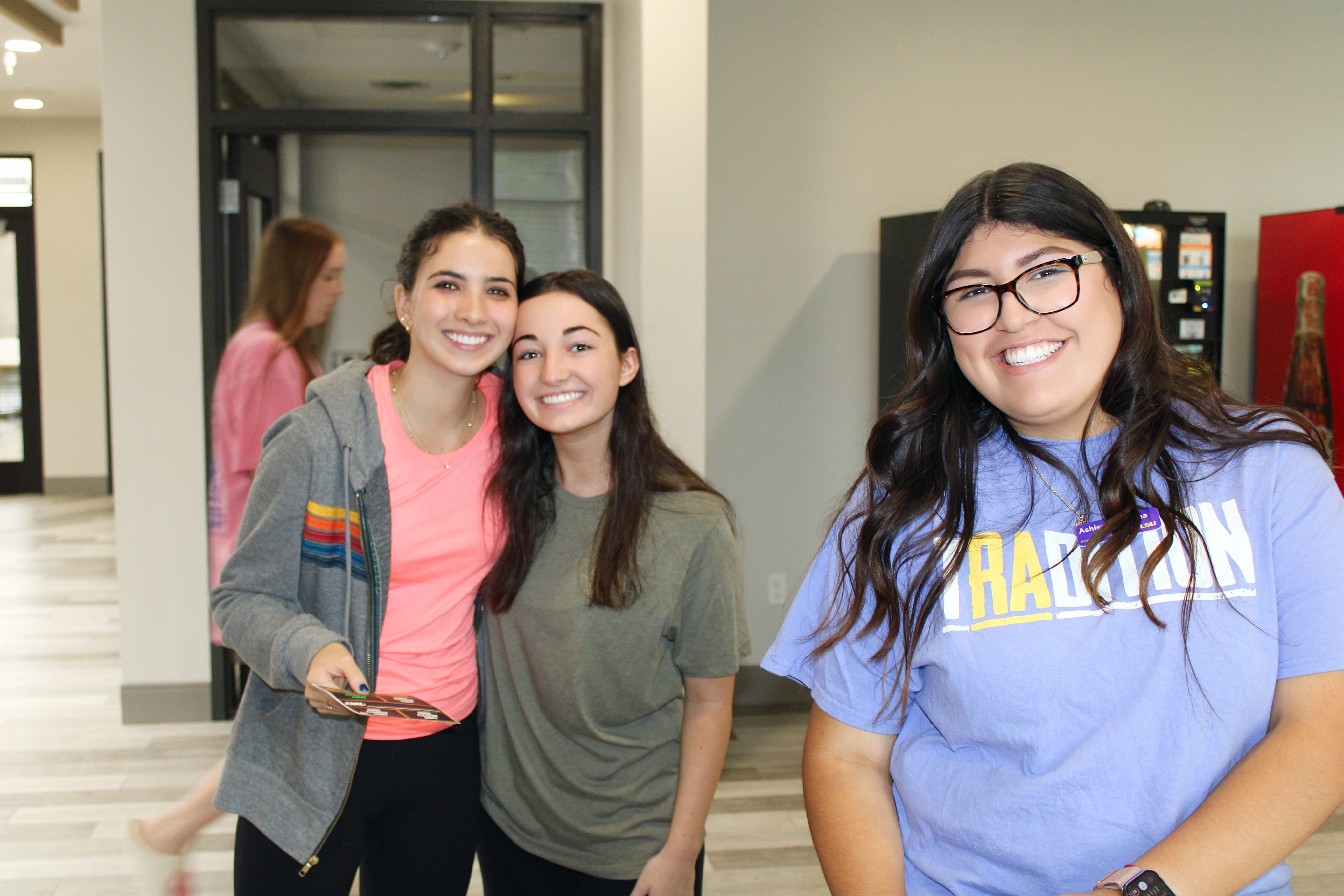 Students posing for a picture in Azalea Hall. 