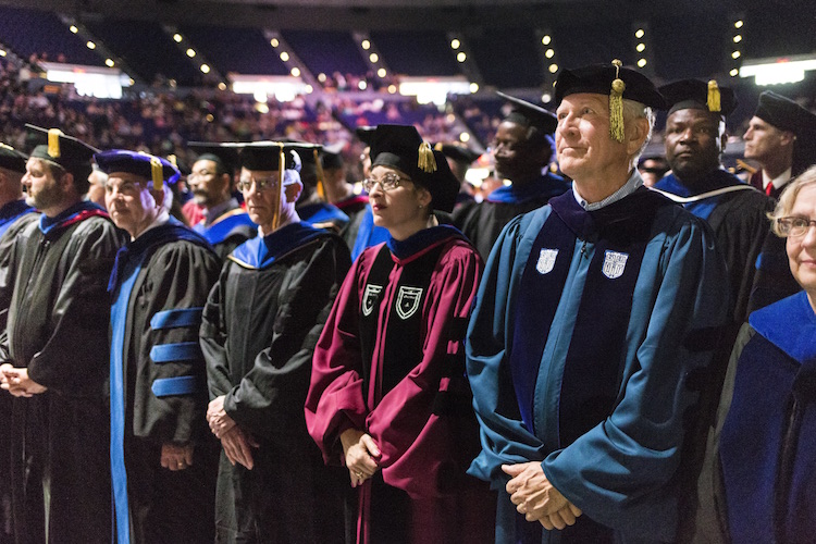 Faculty in regalia at commencement