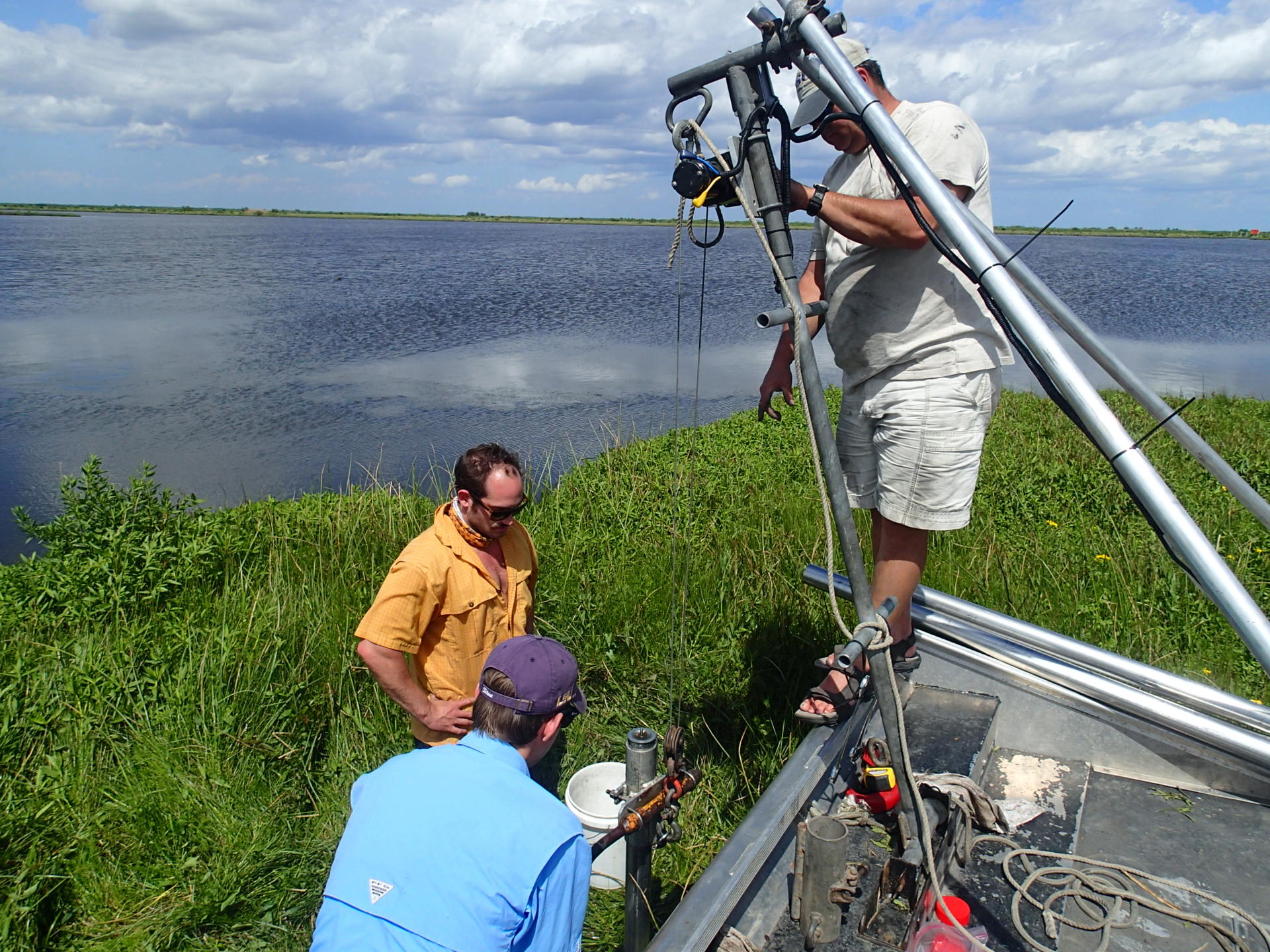 Bill Gibson, LSU’s Costal Studies Institute Field Support Group, guides geology and geophysics' graduate student Jeff Bomer and graduate James Smith during field work to collect vibracores in the upper Brenton Sound Estuary System, South East Louisiana.