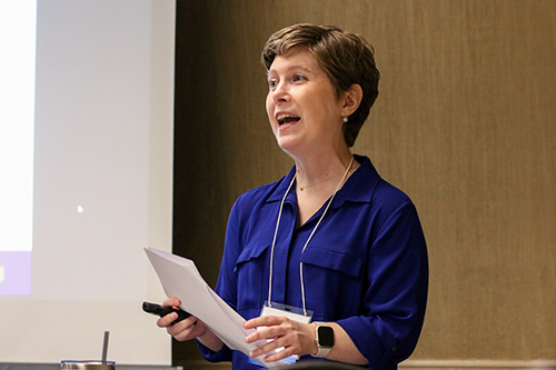 Kristina Little presenting at a conference