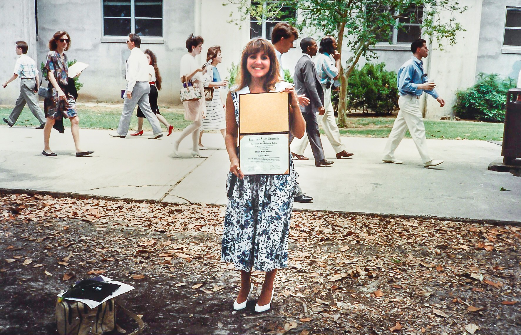 LSU graduate Melain Terry holds her LSU diploma