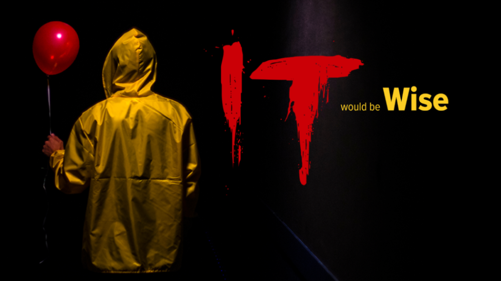 It would be wise Man in yellow jacket holding balloon