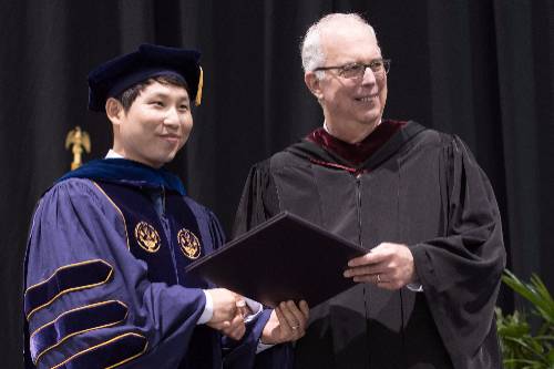 graduate student at commencement