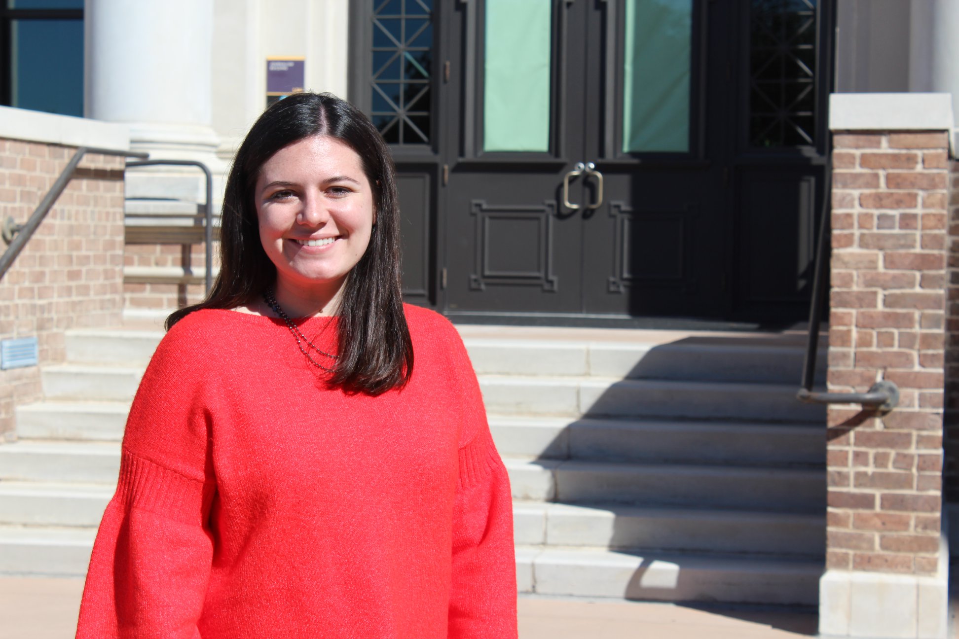 Katie Gagliano poses in front of LSU's Manship School of Mass Communication