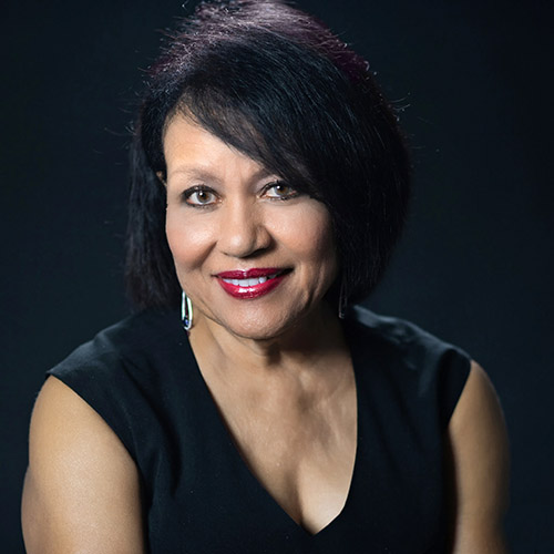 Headshot photo of Maxine Crump